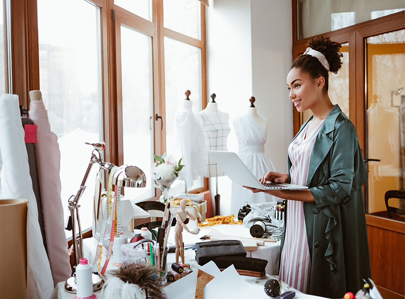 Professional seamstress designer at work
